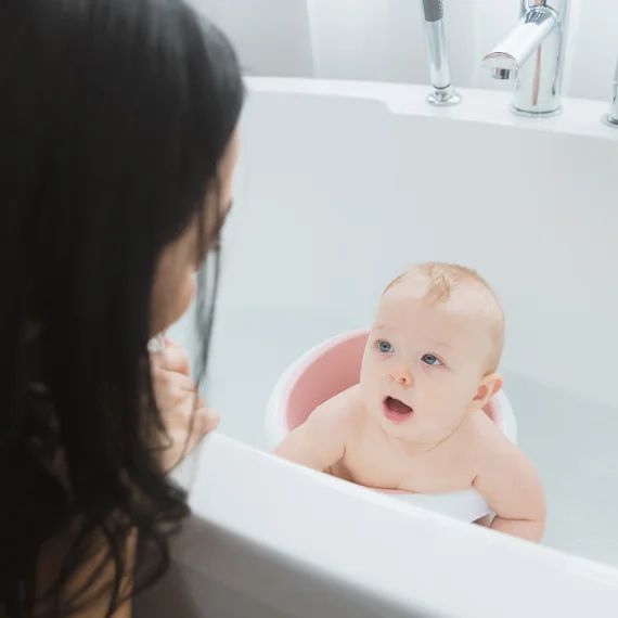 Siège de bain rose clair