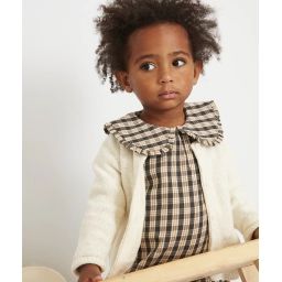 Le gilet écru et ses fils couleur dorée en tricot bébé fille –  – Soldes