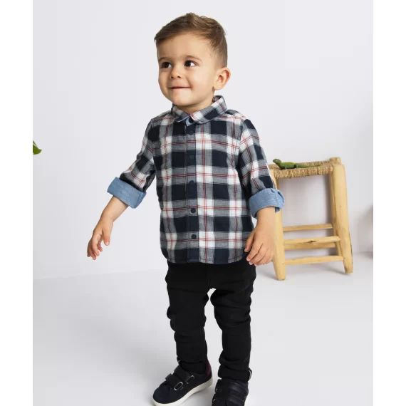 Le jean slim noir à la taille élastiquée –  – Soldes