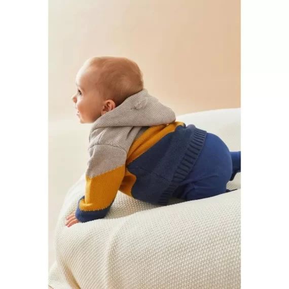 Manteau en tricot tricolore bleu