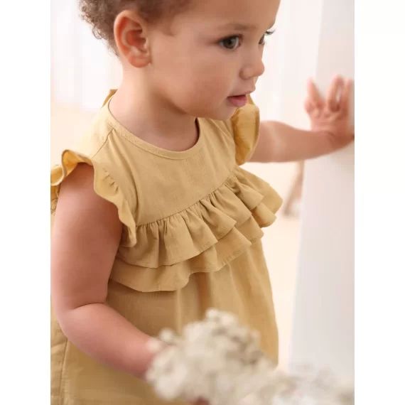 Blouse bébé à volants jaune pâle