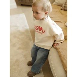 Ensemble sweat-shirt et jean large bébé vanille
