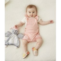 La salopette short rose en maille ajourée avec volants –  – Soldes