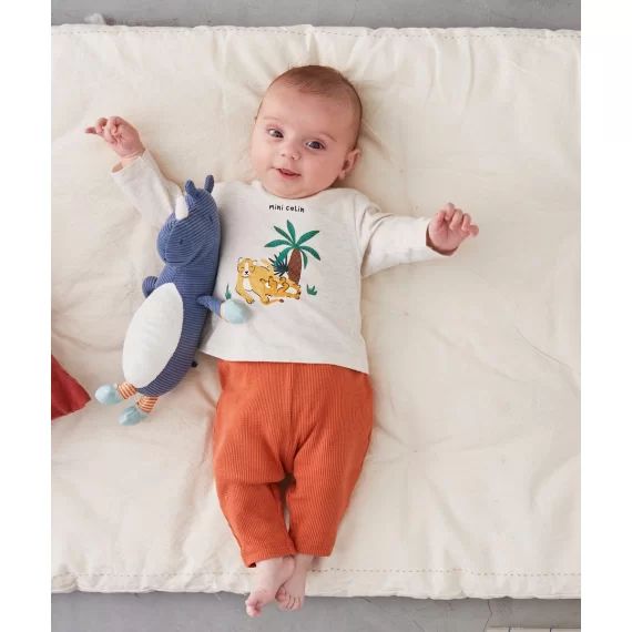 Legging bébé en coton bio marron orangé matière gaufrée –  – Soldes
