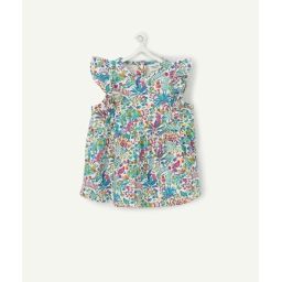 Le t-shirt blanc en coton biologique avec imprimé fleuri