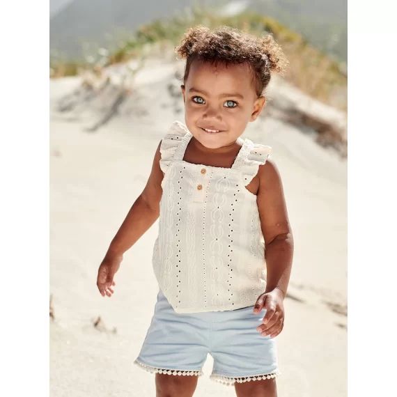 Short bébé finition pompons bleu ciel