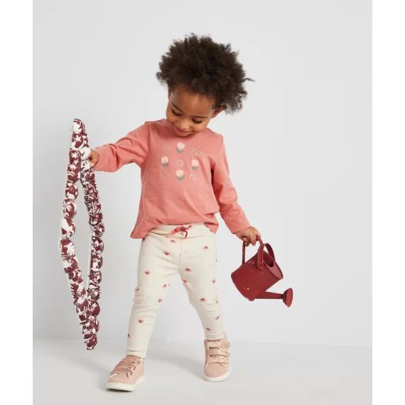 Legging côtelé bébé fille écru et imprimé avec motifs graphiques