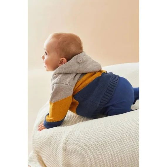 Manteau en tricot tricolore bleu