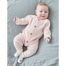 Combinaison en tricot rose
