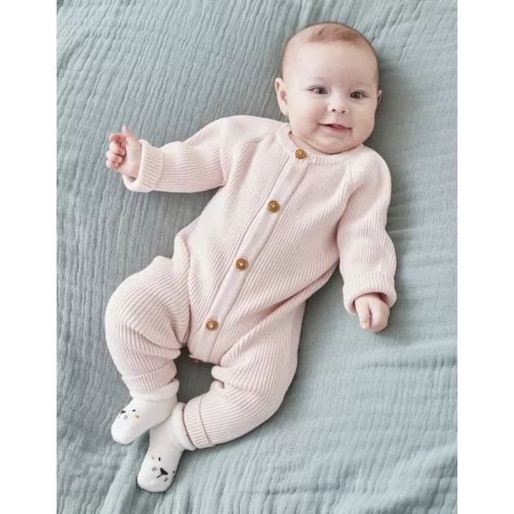 Combinaison en tricot rose