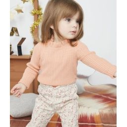 Sous-pull en maille torsadée rose avec col montant bébé fille