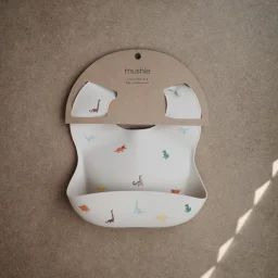 Bavoir à poche en silicone Dinosaure