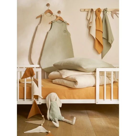 Drap housse bébé uni en gaze de coton Bio* ocre