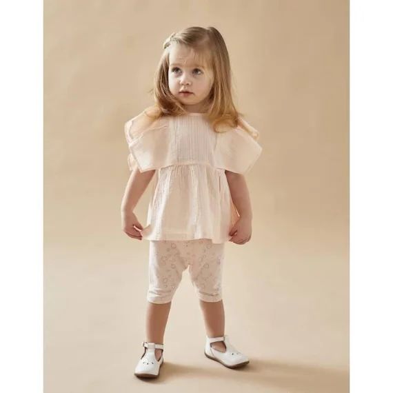 Set blouse uni + legging imprimé rose