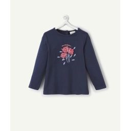 Le t-shirt bleu marine en coton biologique avec fleur en relief