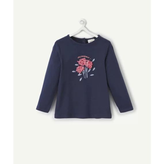 Le t-shirt bleu marine en coton biologique avec fleur en relief