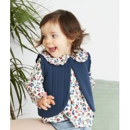 Gilet sans manches bleu matelassé en rembourrage recyclé –  – Soldes