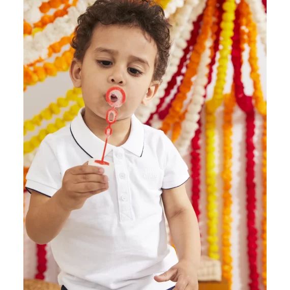 Polo bébé garçon en coton blanc avec message –  – Soldes