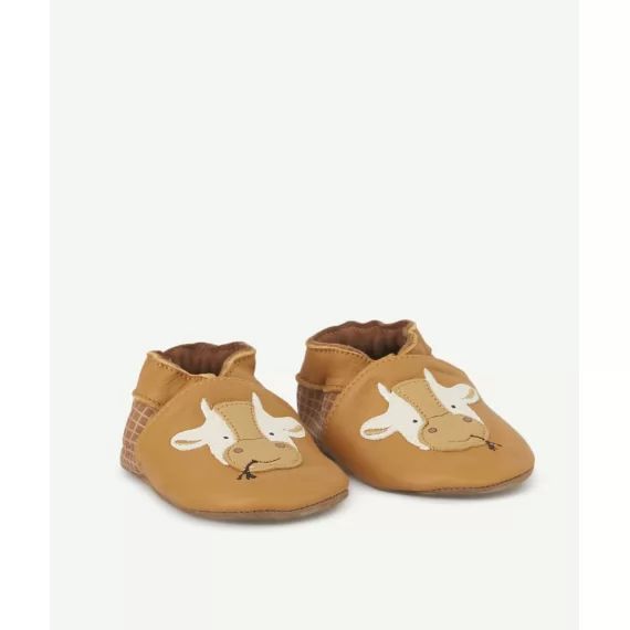 Les chaussons en tannage végétal camel avec vaches –  – Soldes