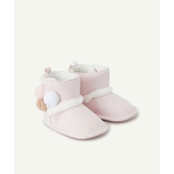 La paire de chaussons bébé fille rose avec pompons