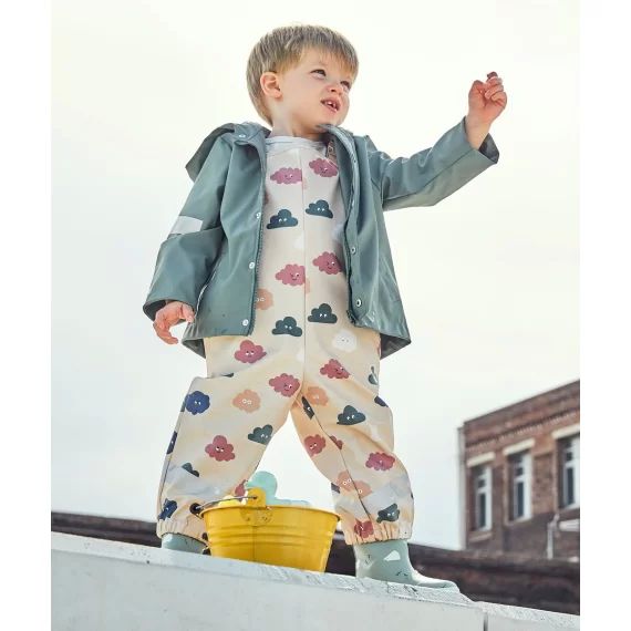 Salopette imperméable bébé mixte beige et imprimée avec nuages
