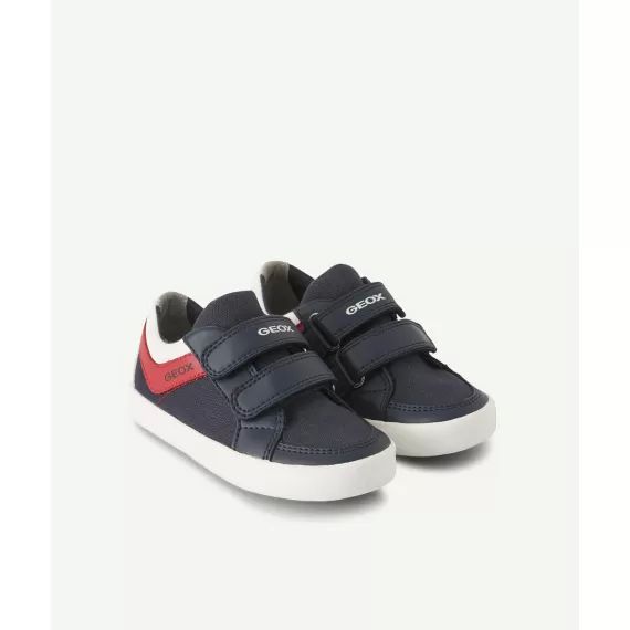 Les baskets bleu marine à scratch avec détails colorés