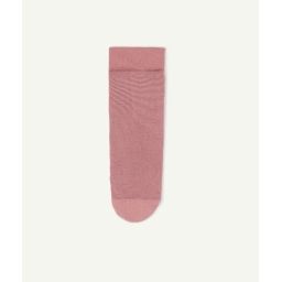 Les collants roses avec détails brillants et rayures