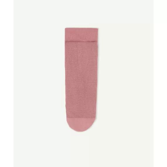 Les collants roses avec détails brillants et rayures